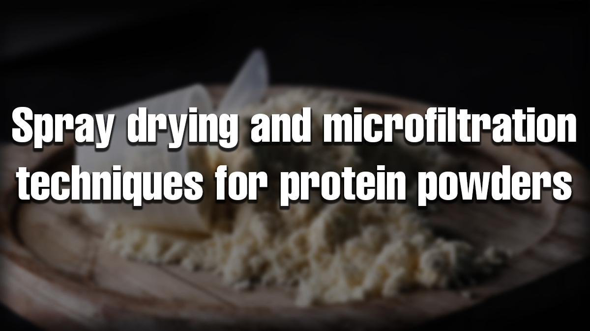 Protein powder on a wooden board illustrating spray drying microfiltration protein processing techniques.